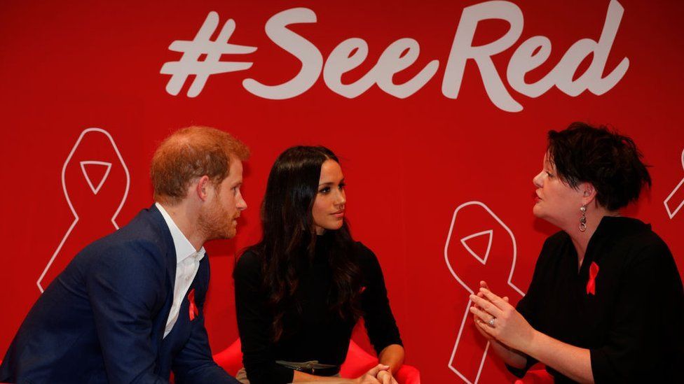 Meghan Markle, Prince Harry and Terrence Higgins Trust trustee Dr Laura Waters