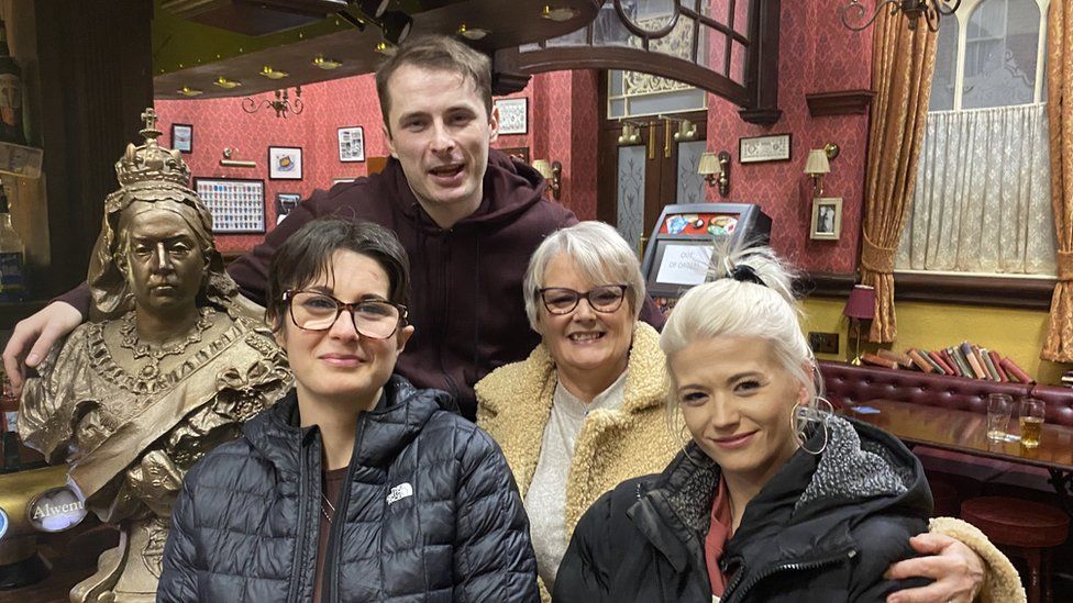 Kylie Weatherby, her mum Barbara and Danielle with Max Bowden who plays Ben Mitchell inside the Queen Vic