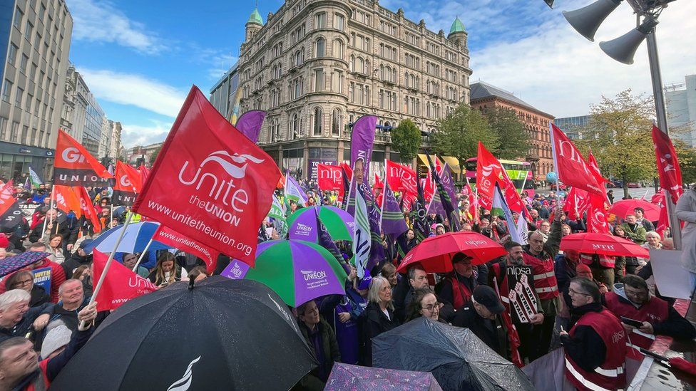 Workers staging a demonstration outside Belfast City Hall