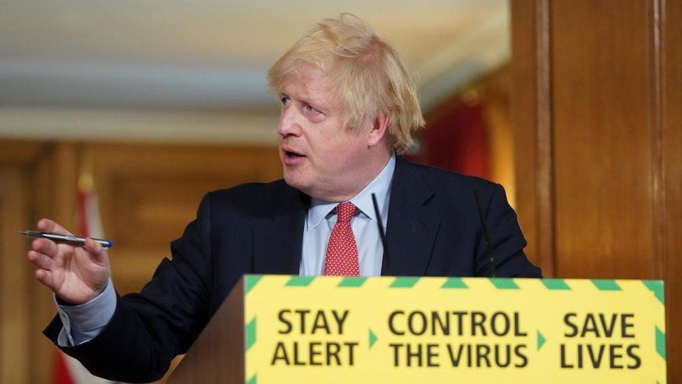 Then Prime Minister Boris Johnson during a Covid news conference