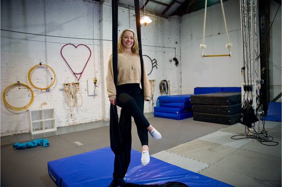 Angela says aerial acrobatics helps her switch off